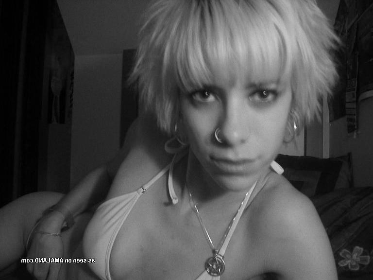 18P Photos of a horny pierced babe displaying her naked body