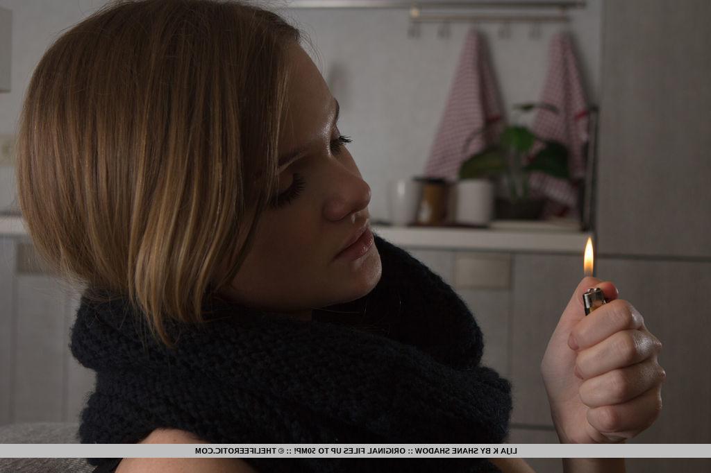 16P Blonde model Lija K gets naked and fingers her pussy in "Flame"