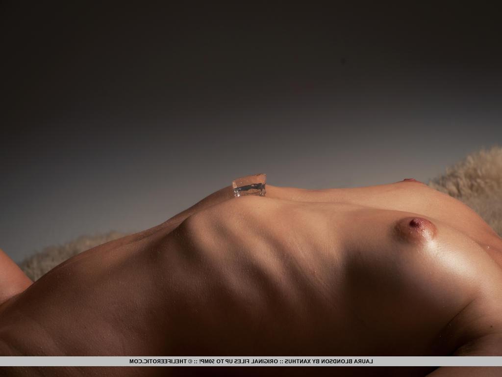 16P Blonde beauty Laura Blondson cools off her hot body with an icecube