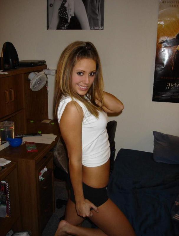14P Brunette babe teases on cam by showing off her fine curves