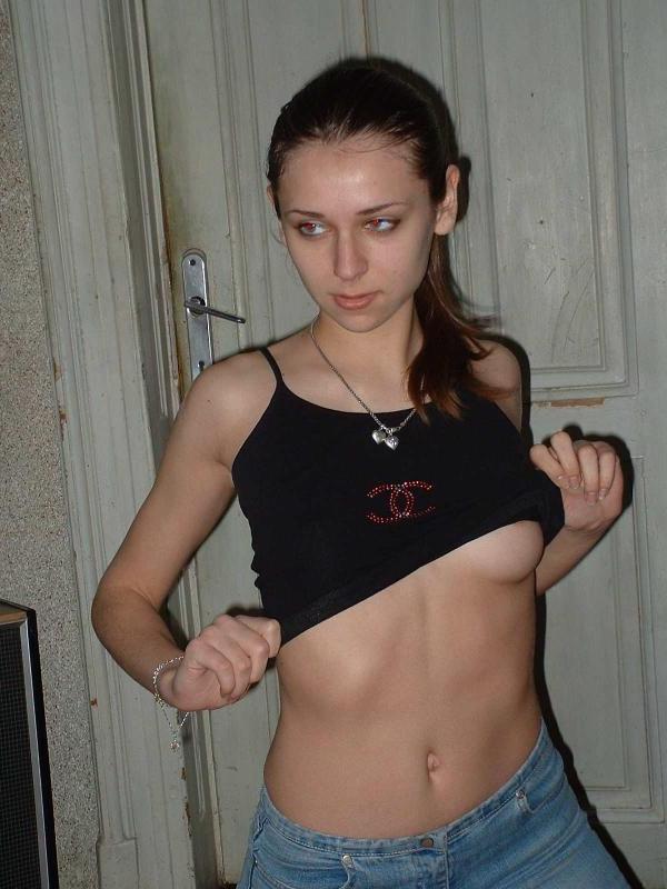 14P Sexy brunette hottie teases on cam by wiggling her tight ass