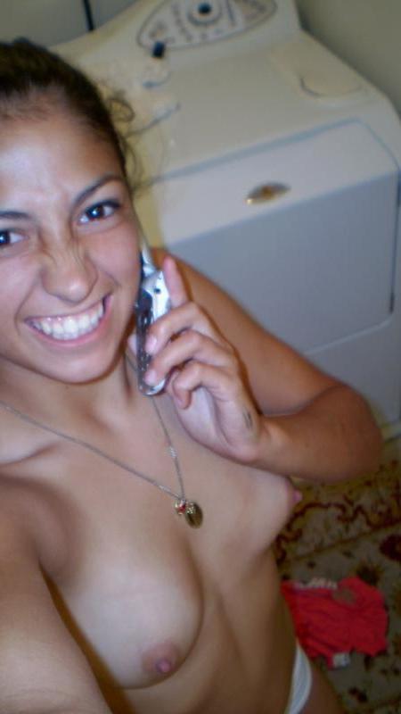 14P Gorgeous brunette babe teases on camera