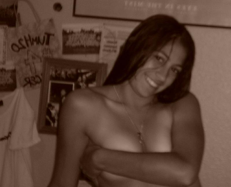 14P Gorgeous brunette babe teases on camera
