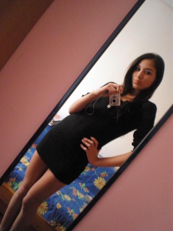 14P Gorgeous sexy honey displays her tight body in mini dresses