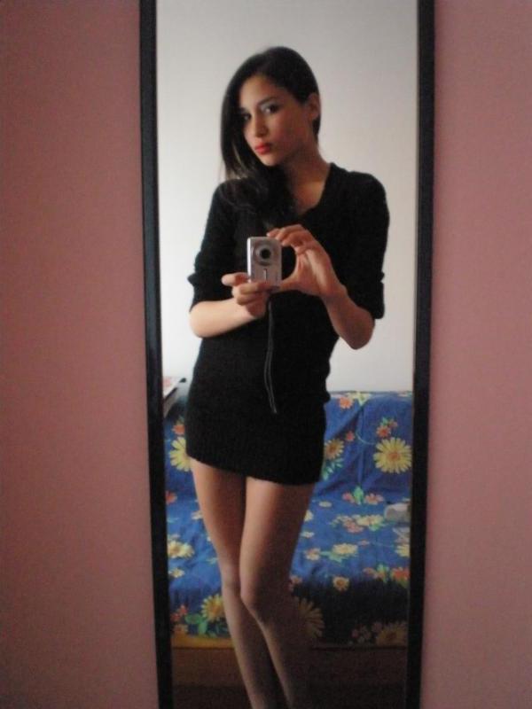 14P Gorgeous sexy honey displays her tight body in mini dresses