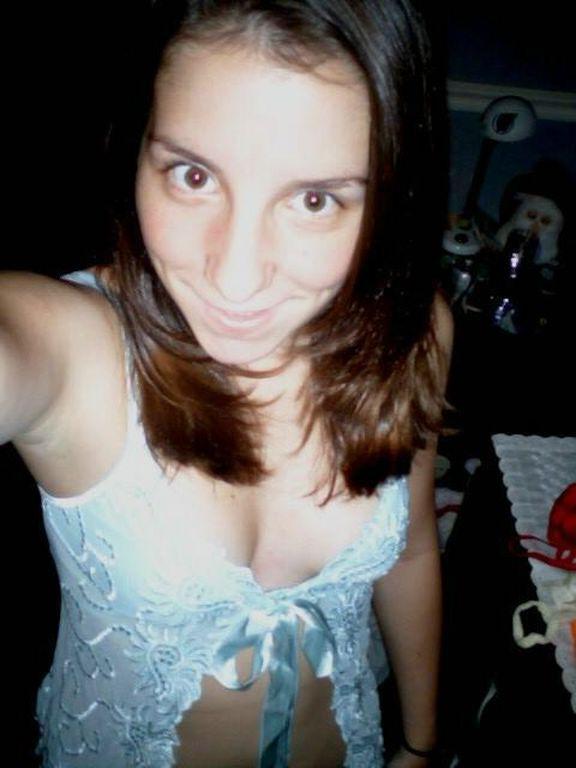10P Horny brunette chick showing off her pierced nipple on cam