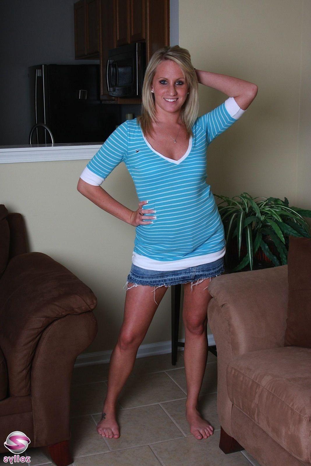 15P Pictures of a blonde girl stripping to her panties