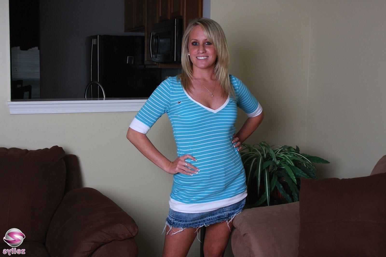 15P Pictures of a blonde girl stripping to her panties
