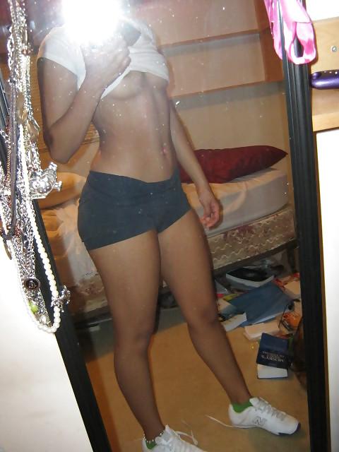 25P Ebony hottie shows her big clit