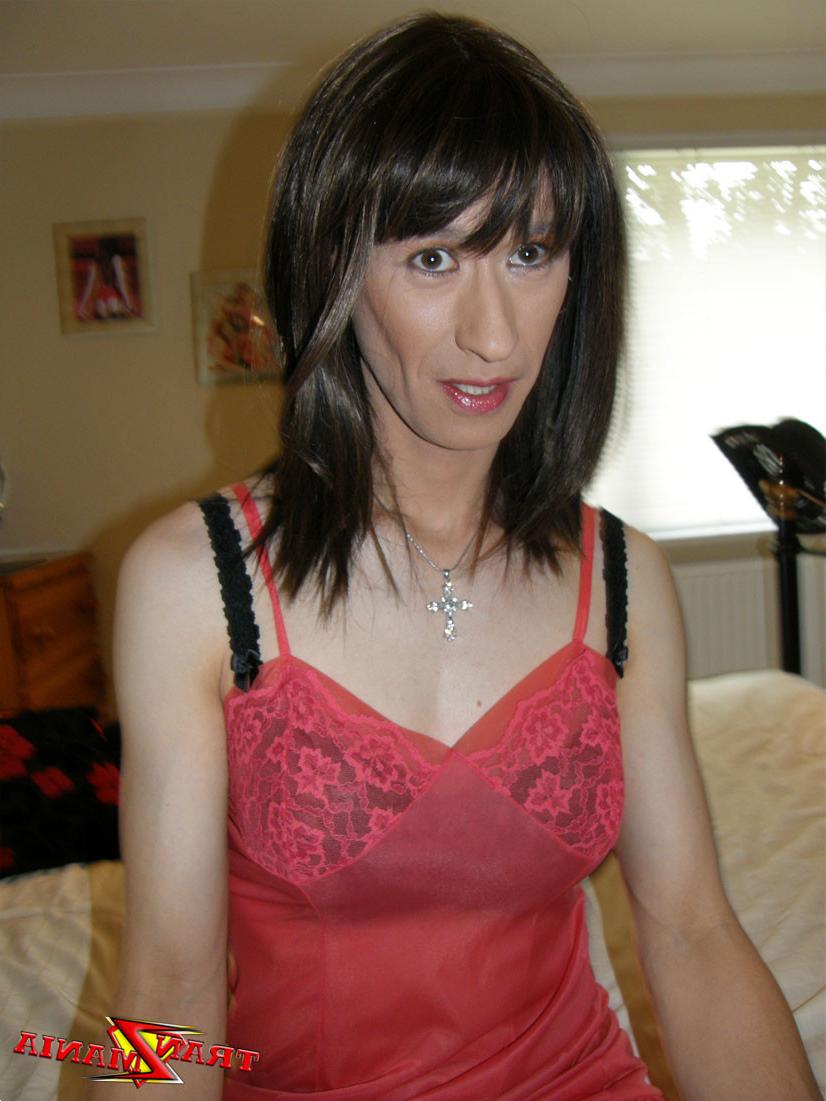 15P Sexy and slender crossdresser wearing pink negligee