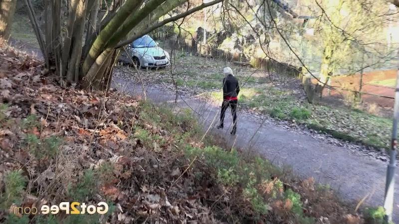 15P Hot blonde has a warm piss outside on steps