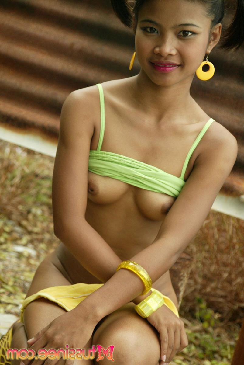 11P Pigtail cutie Tussinee is outside and decides to strip to show her body