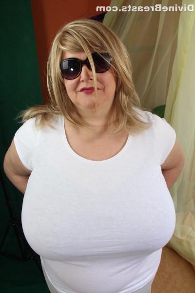 15P Mature amateur plumper lets humongous titties hang out