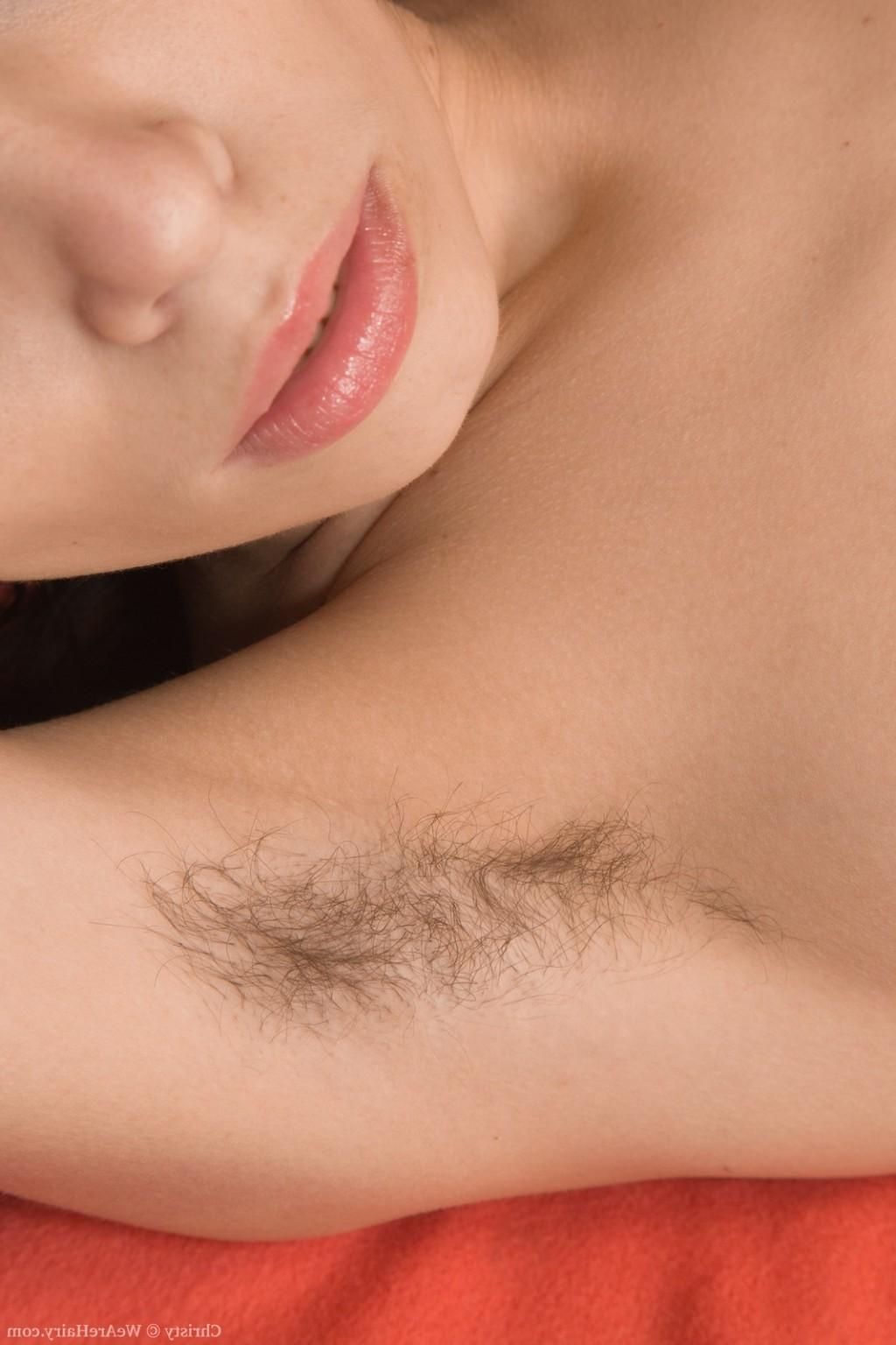 13P Christy strips naked on her orange sofa 