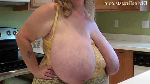 15P Plump amateur bouncing and sucking her gigantic boobs