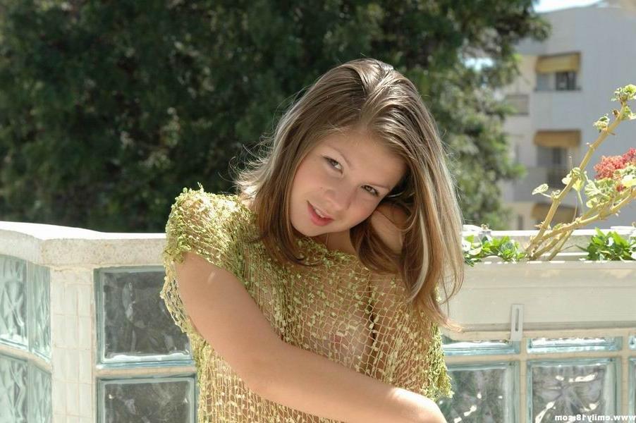 15P Emily showing her body on the balcony