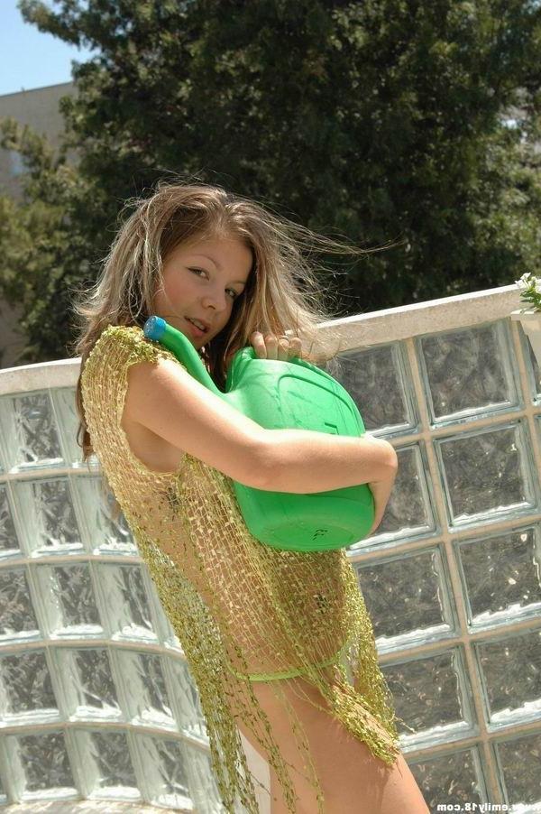 15P Emily showing her body on the balcony