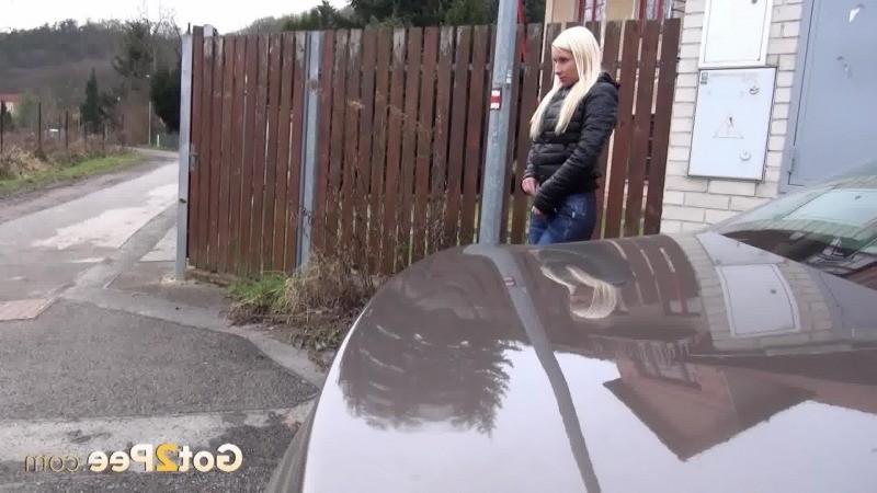 15P Blonde babe pisses onto concrete like a sprinkler