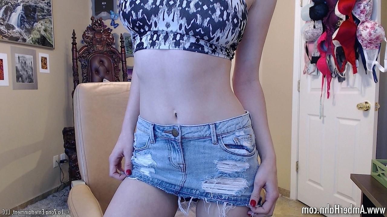 15P Amber Hahn wears a mini denim skirt with her crop top
