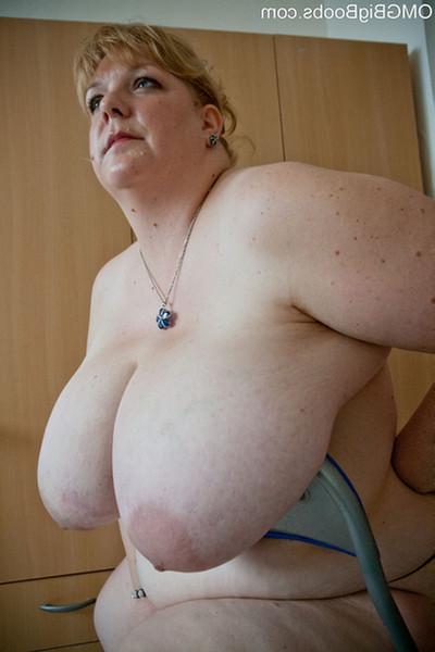 15P Plump amateur with humongous bazookas shows off titties