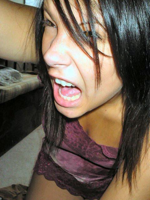 10P Babe poses half naked before her own camera