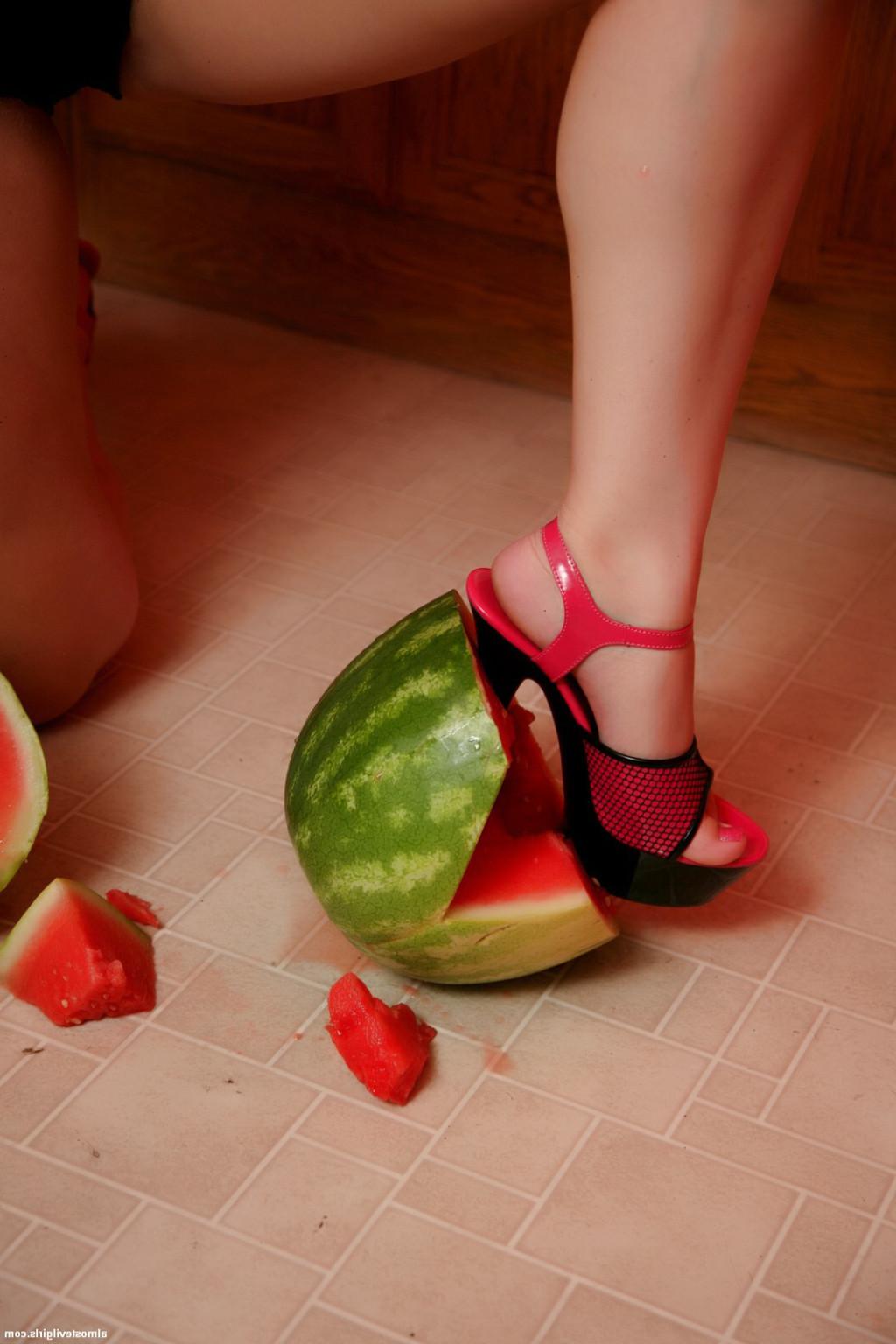 15P Amateur Red Headed Punk babe smashes watermelon flashes her little tits