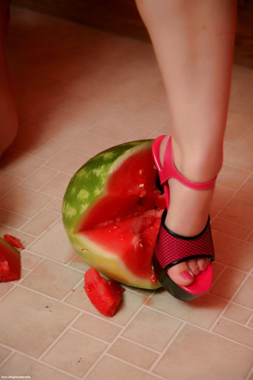 15P Amateur Red Headed Punk babe smashes watermelon flashes her little tits
