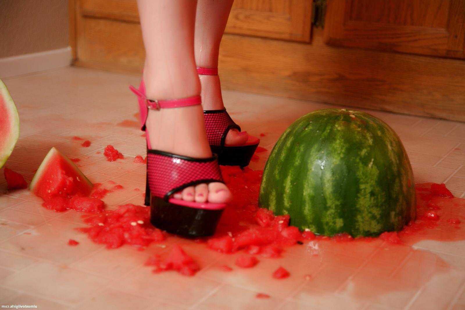 15P Amateur Red Headed Punk babe smashes watermelon flashes her little tits
