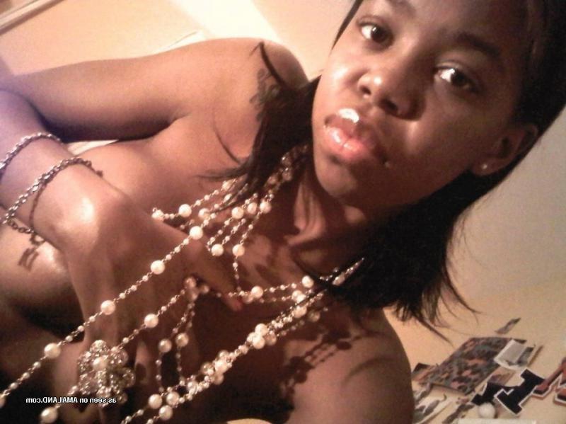 12P Amateur ebony GF with pierced nips taking topless pics