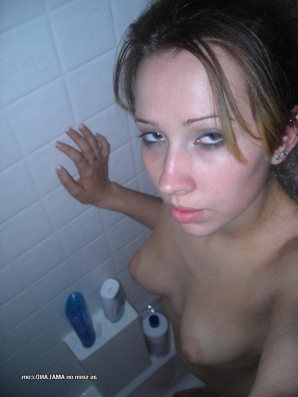 12P Emo chick showing off her sexy inked back