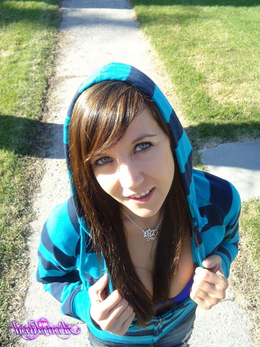 8P Pretty teen spreading her pussy and teasing on a swing