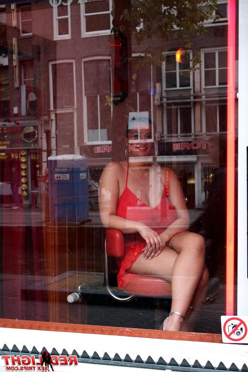 14P Amsterdam hooker with massive tits pleasing a tourist cock