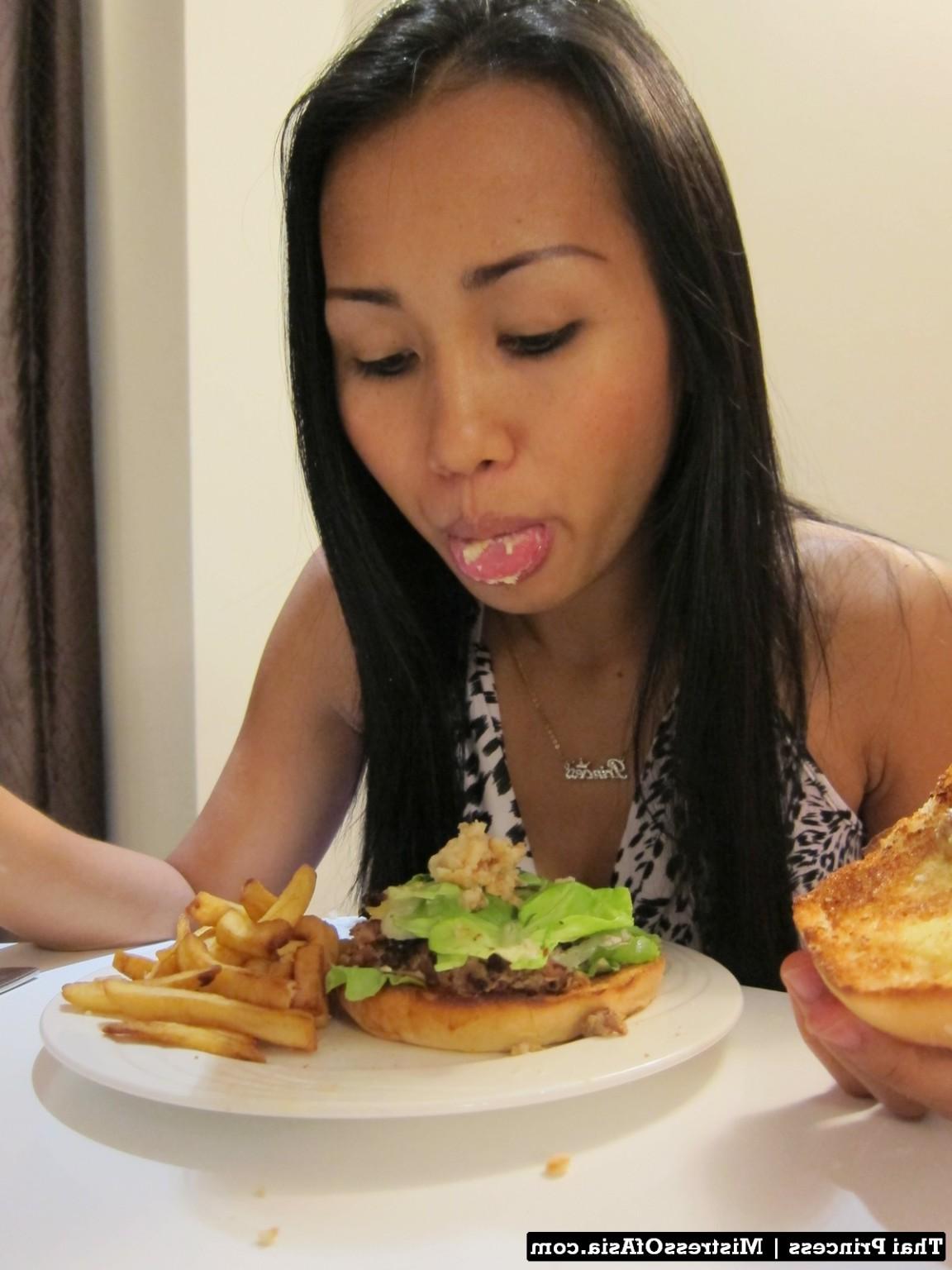 12P Thai Princess eating burger
