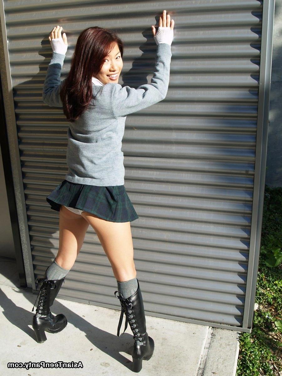 16P Asian schoolgirl outdoors