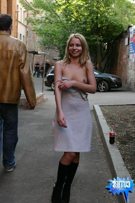 16P Teen kitty pulls down her dress on a busy street