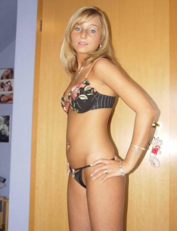 10P Home erotic pics feature blonde trying on hot lingerie