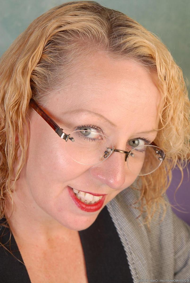 15P Horny blonde milf teacher in black stockings