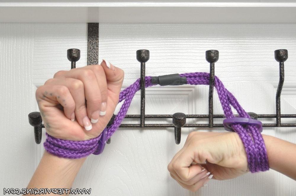 12P This ho is tied up in the cupboard by her master