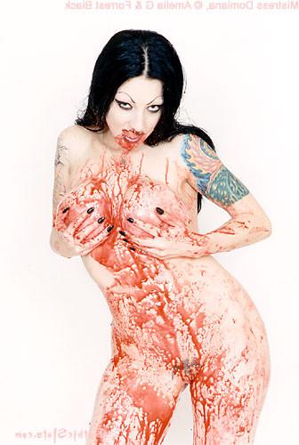 15P Tattooed vampire girl covers herself in blood