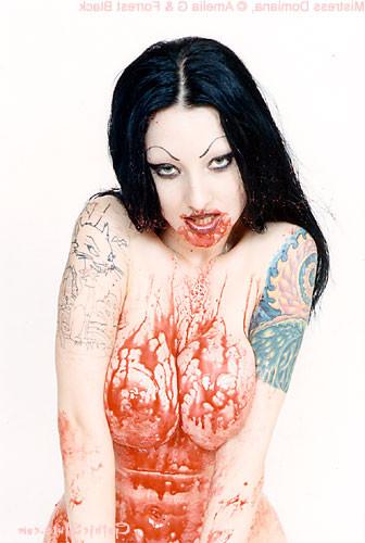 15P Tattooed vampire girl covers herself in blood