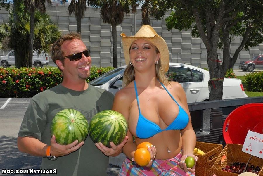 12P Check out this hot fruit selling bikini babe on the side of the street selling c