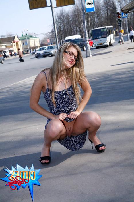 16P Fresh blonde teen poses topless on a busy street