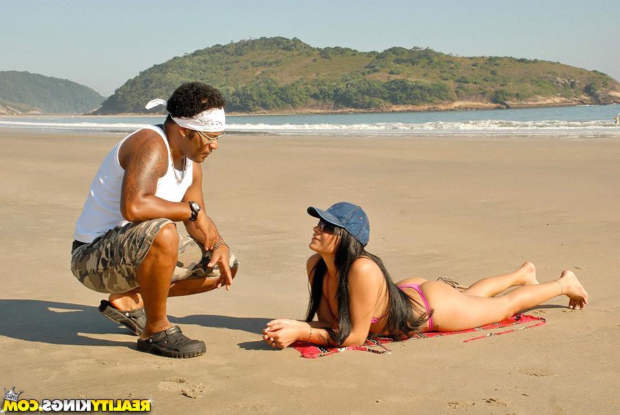 12P Watch this amazing big booty brazilian take a rod up her ass in these beach side