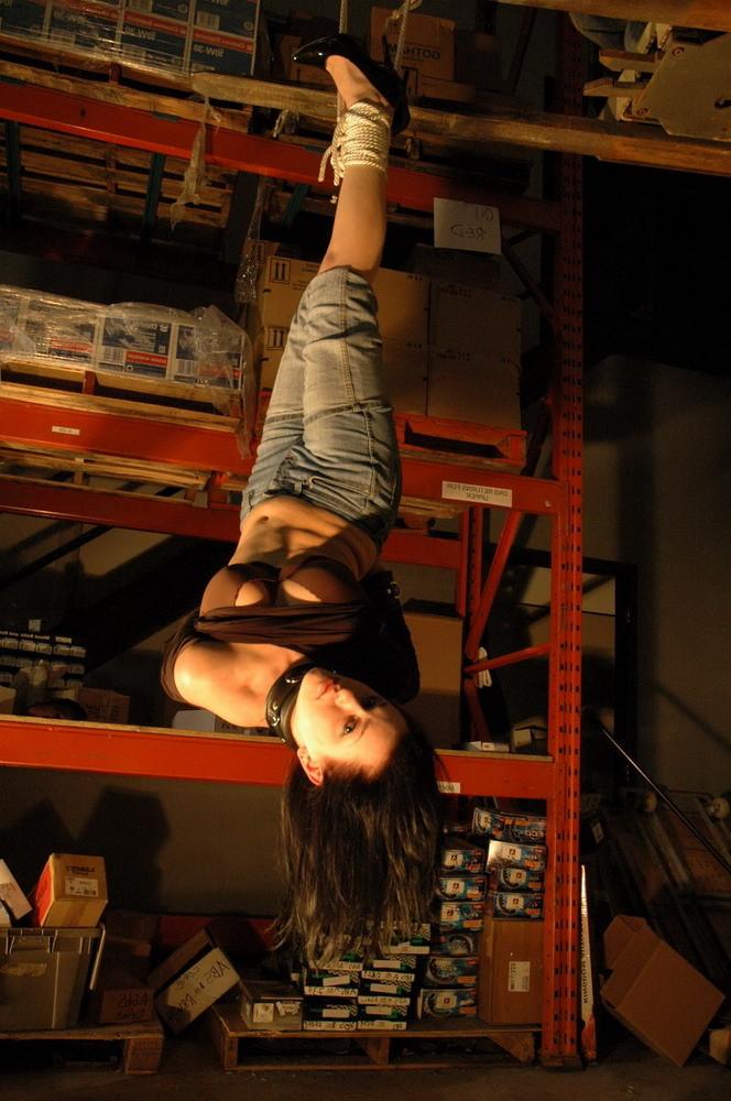 16P This slave is taken to a warehouse owned by her Master and suspended from a fork