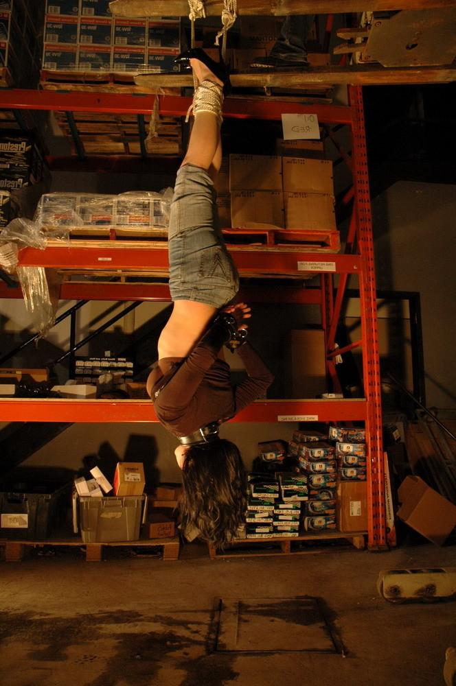 16P This slave is taken to a warehouse owned by her Master and suspended from a fork
