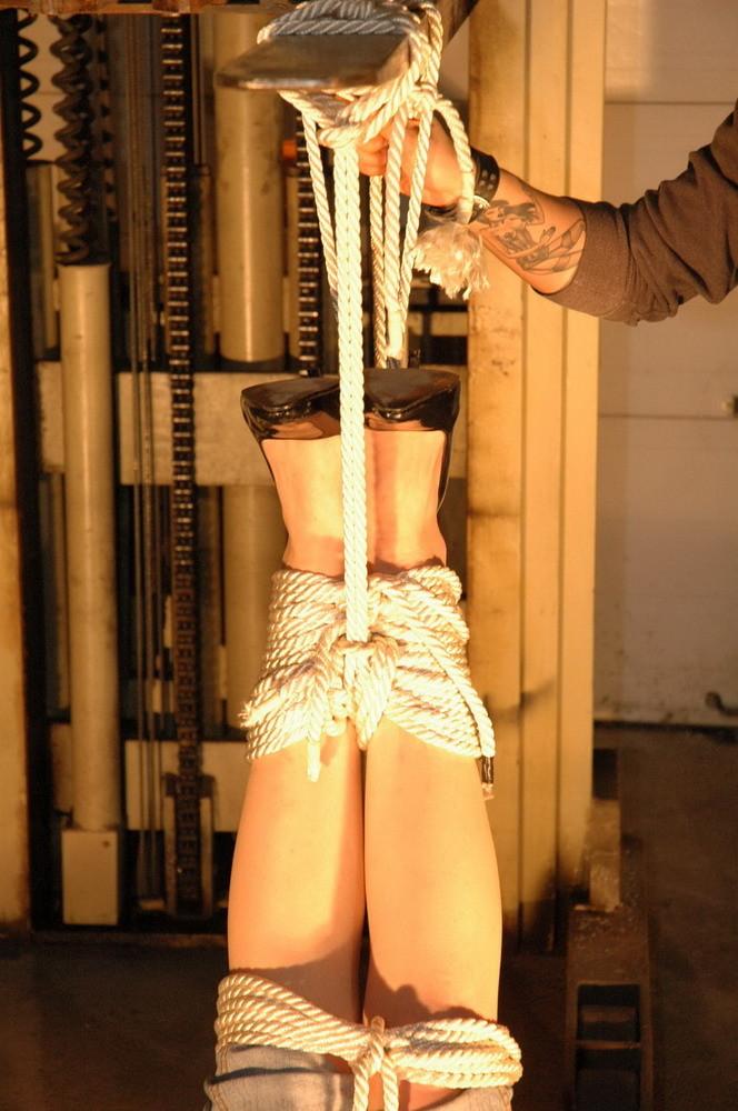 16P This slave is taken to a warehouse owned by her Master and suspended from a fork