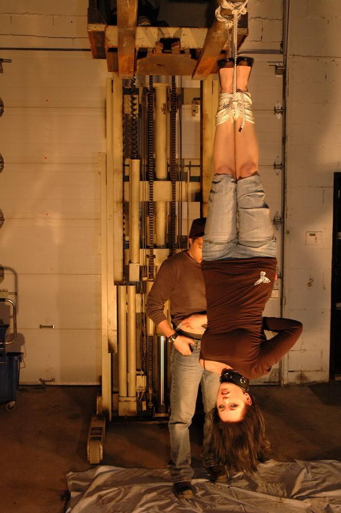 16P This slave is taken to a warehouse owned by her Master and suspended from a fork