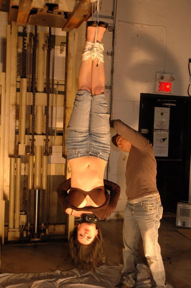 16P This slave is taken to a warehouse owned by her Master and suspended from a fork
