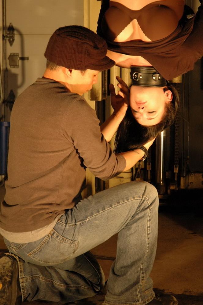 16P This slave is taken to a warehouse owned by her Master and suspended from a fork