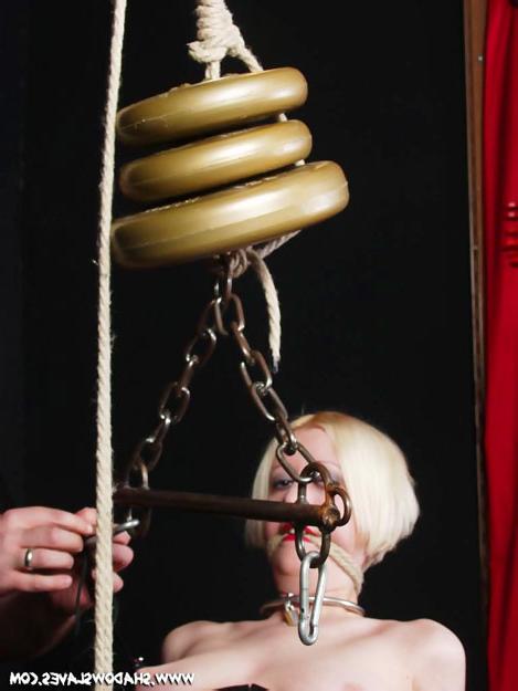 15P Corseted submissive in hands of sadistic master